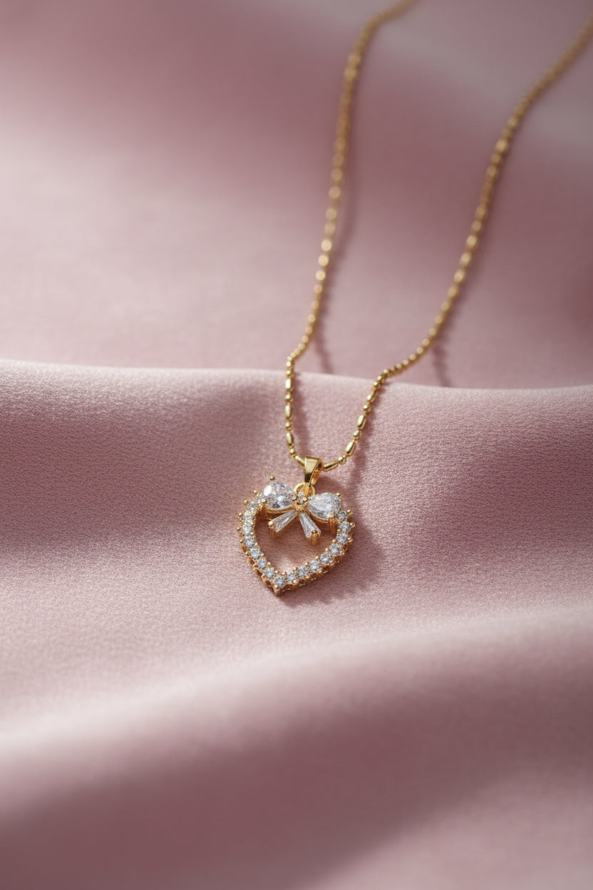 Bow-Accented Radiant Heart pendent