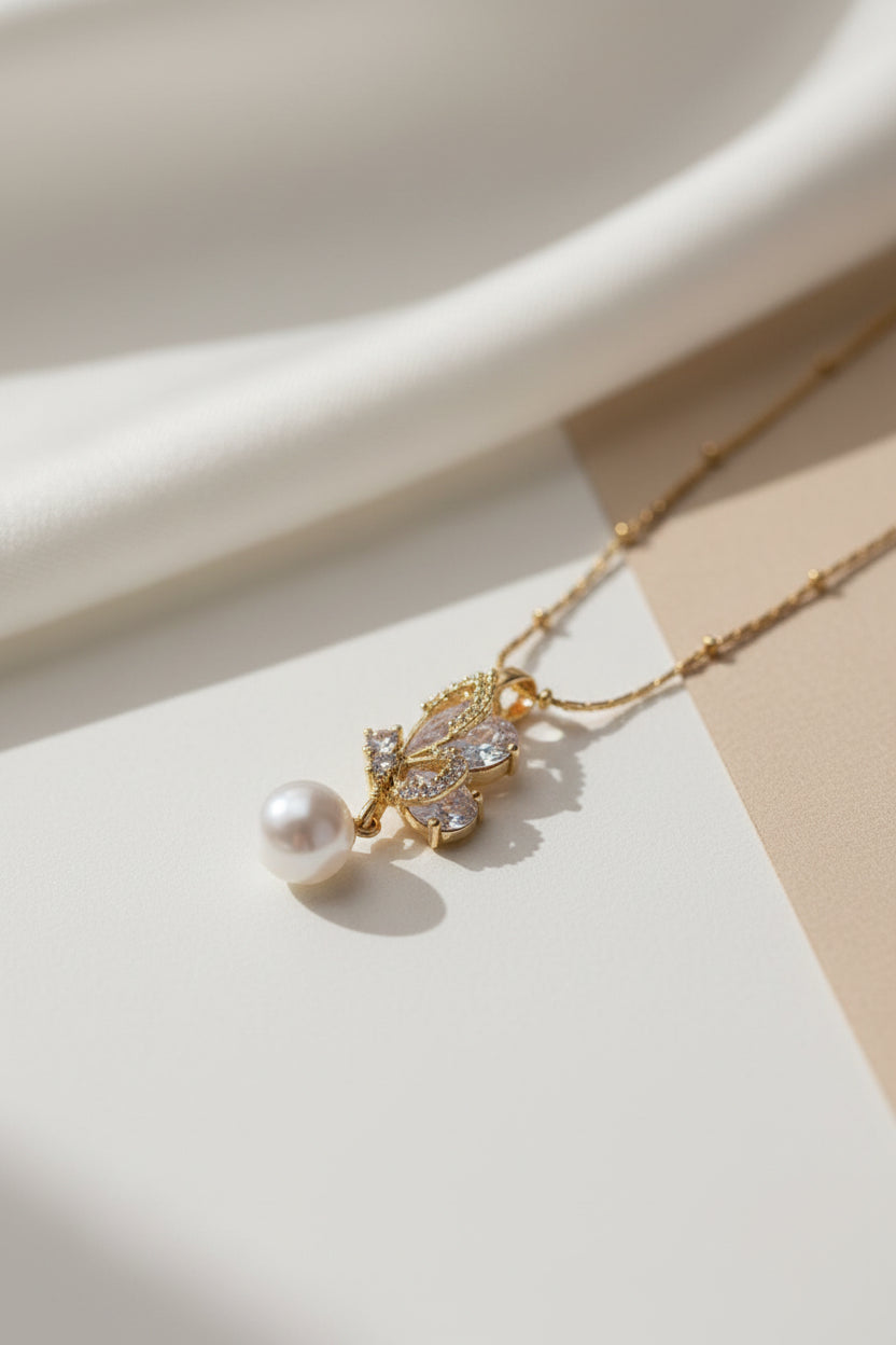 Butterfly& pearl drop pendent