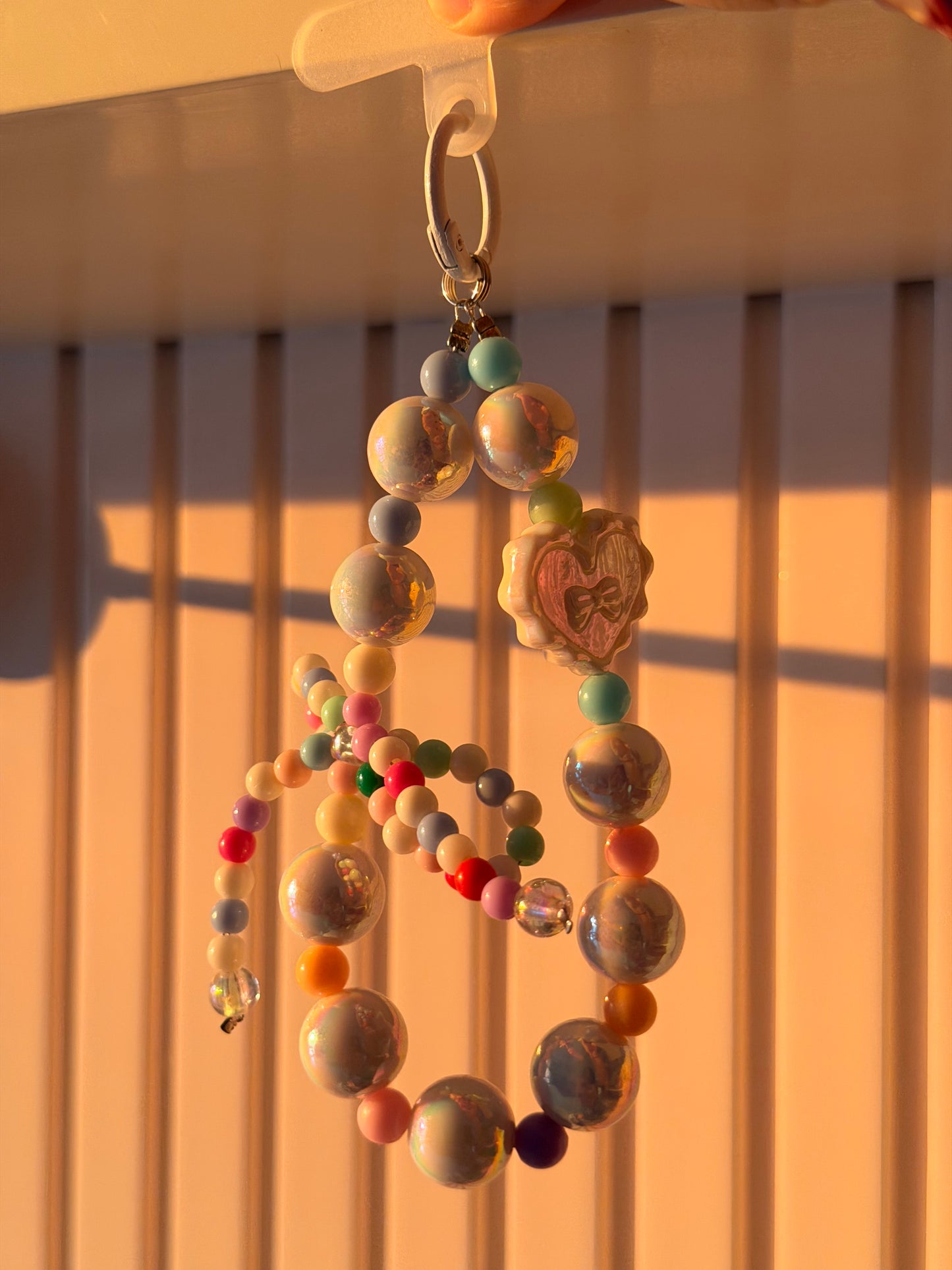 Multi colour bow bag/phone charm