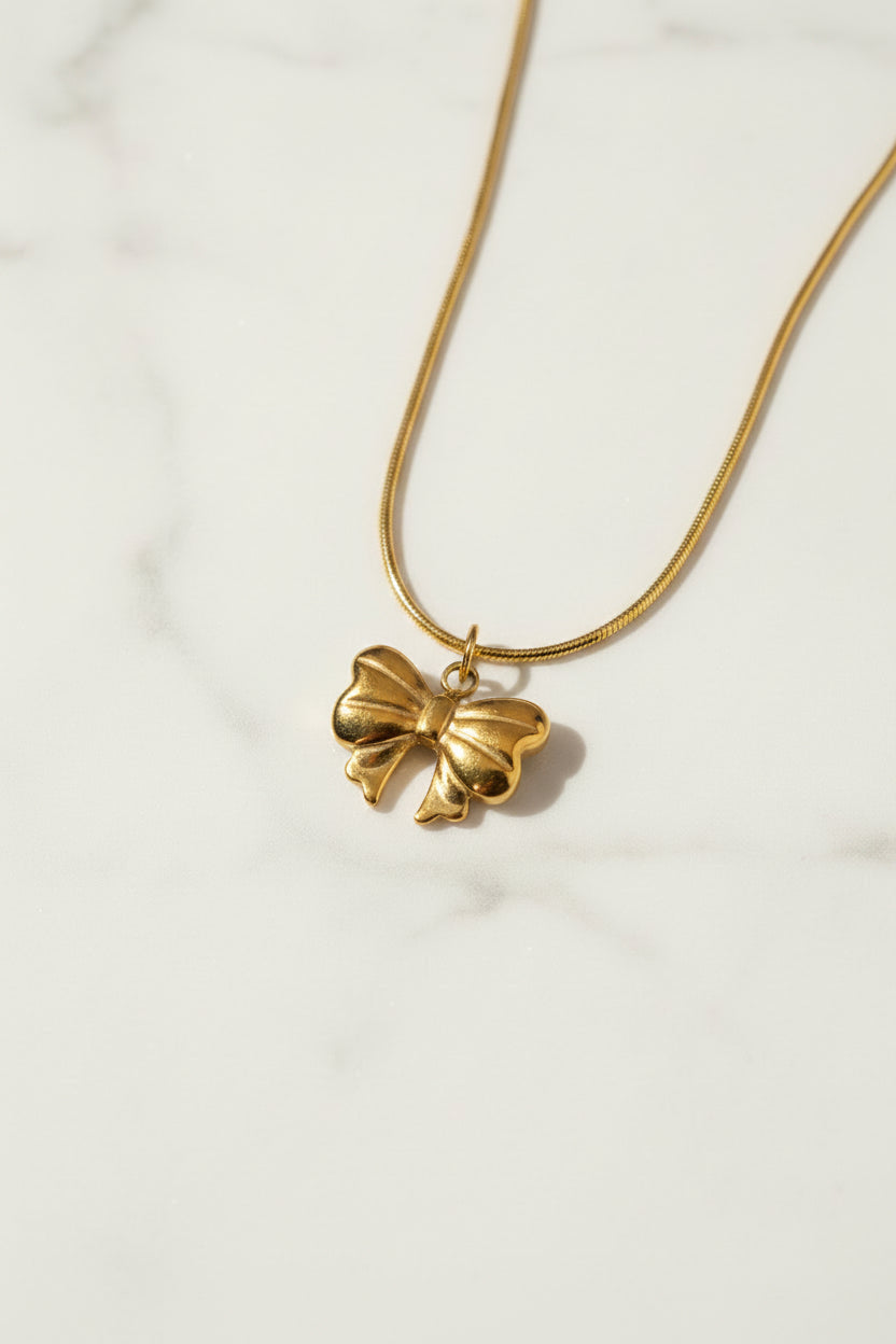 Golden bow necklace