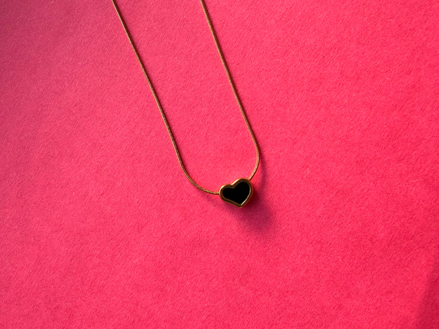 Reversible heart pendent